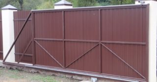 Купить откатные ворота из профнастила Спасск-Дальний, цена от 1747 руб.