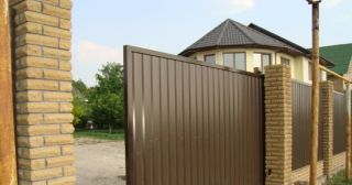 Купить откатные ворота из профнастила Спасск-Дальний, цена от 1747 руб.